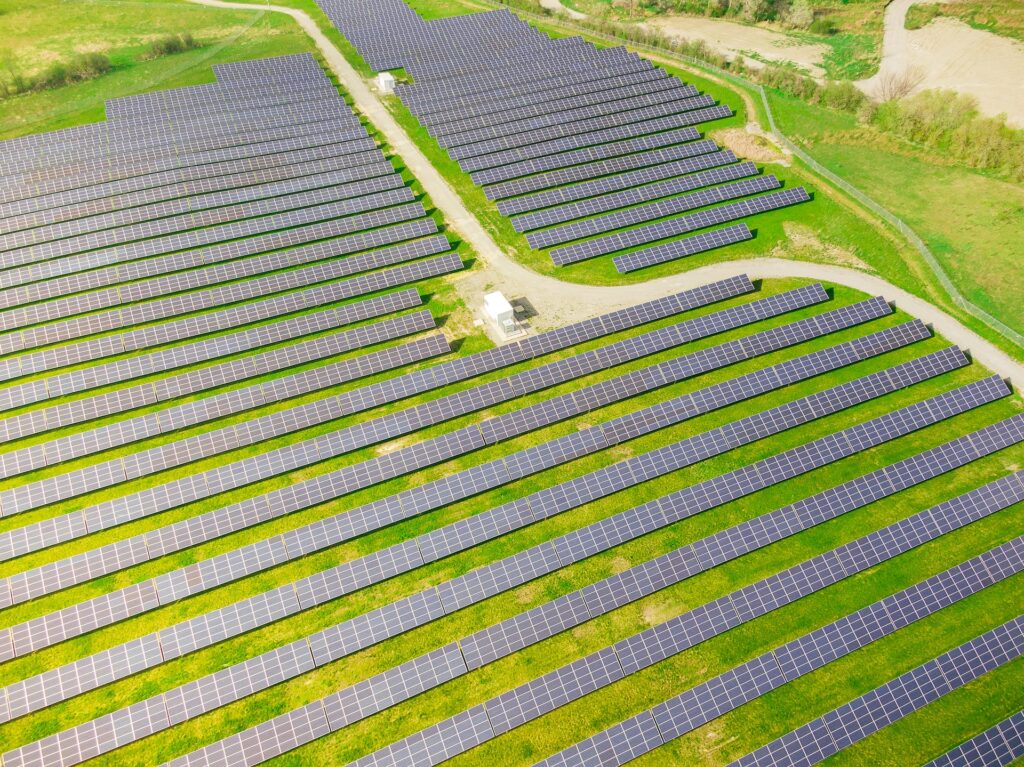 Global Solar Projects: BTF Green Solar Projects on a global level. Huge solar panel park in a green environment